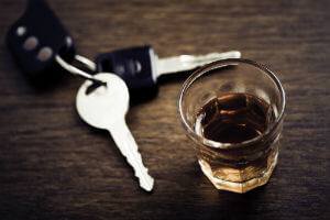 car keys and alcoholic drink