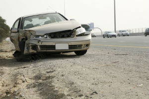 car damaged by road debris