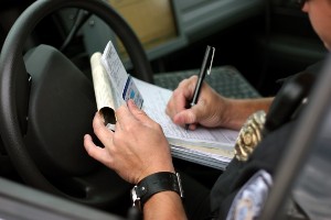 police officer reviewing driver's license