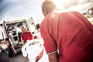 emt medics transporting an injured person