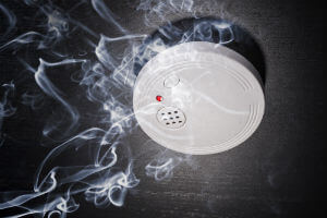 smoke reaching a fire detector