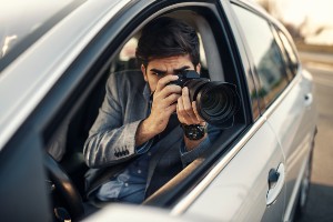 private investigator in car