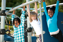 Kids on monkey bars