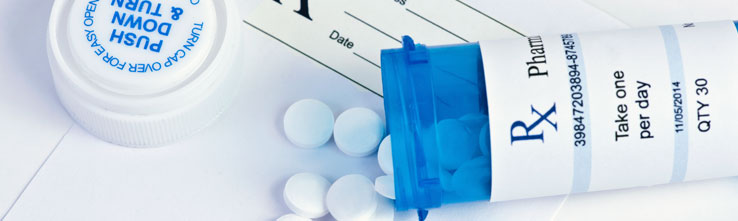 prescription pad and pills