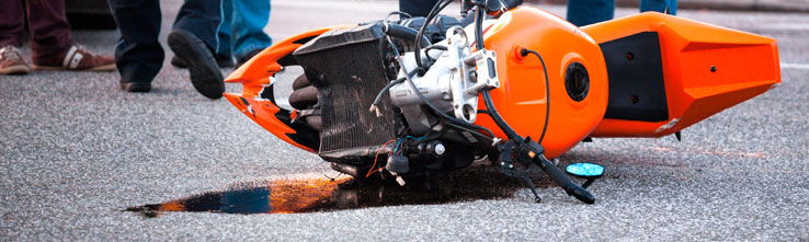 damaged motorcycle on the ground