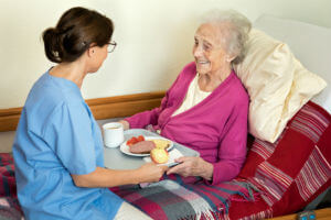 nursing home resident eating a meal