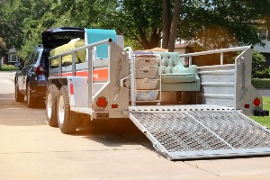 driver loading and securing vehicle