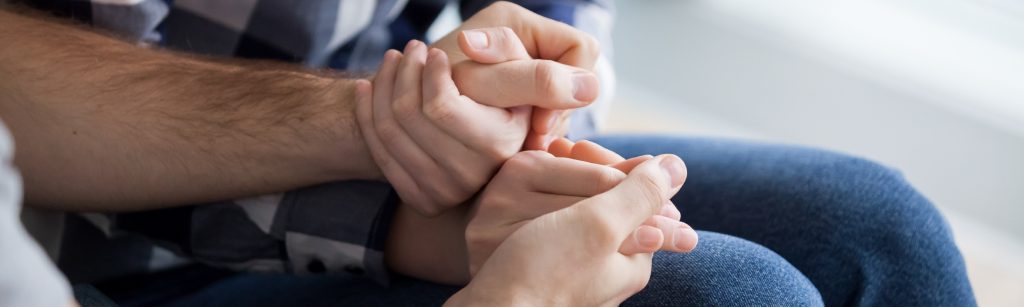 couple holding hands