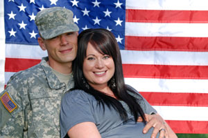 a soldier with his pregnant wife