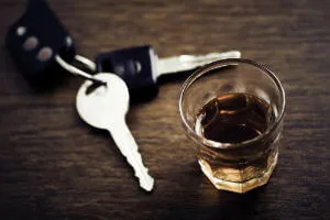 car keys and alcoholic drink