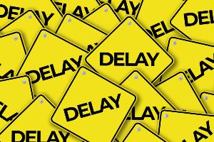 road signs that say delay
